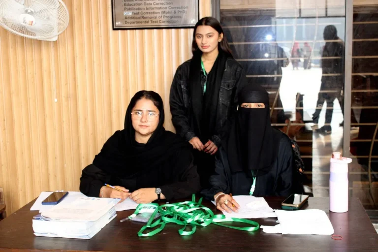 Organising team at the registration desk of GCHCSS-25 at Bahauddin Zakariya University, Multan