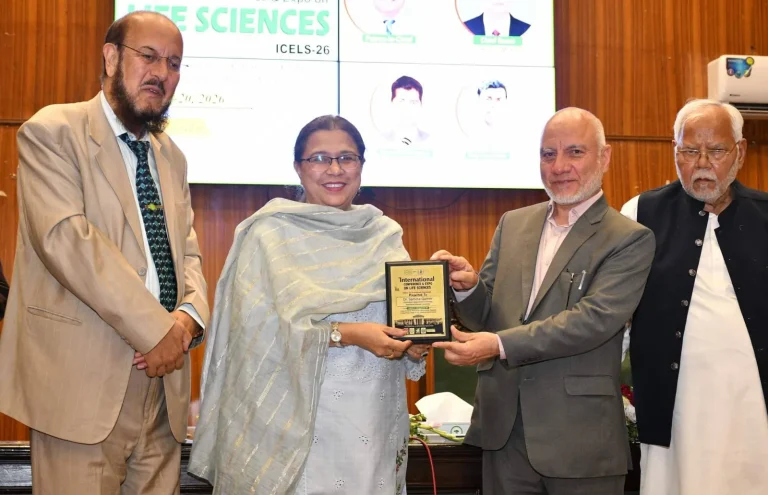 Commemorative shield presented to a guest speaker on the ICELS-26 stage in Rawalpindi