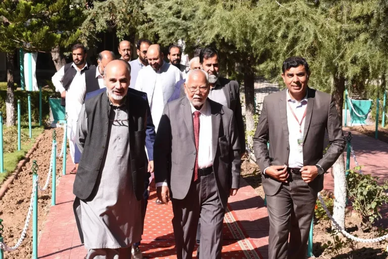 Organisers and dignitaries walking to the ICEPSD-25 conference hall at COMSATS University Islamabad, Abbottabad Campus
