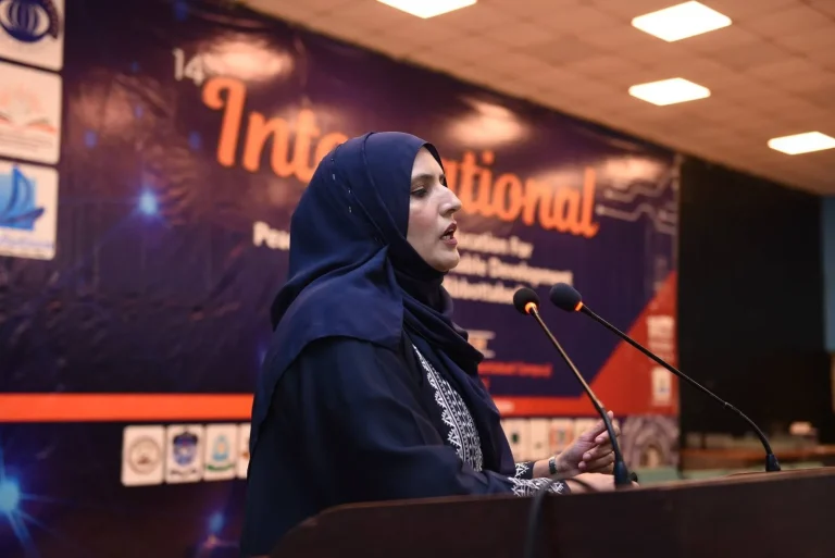 Speaker presenting her paper at the 14th ICEPSD-25 conference in Abbottabad