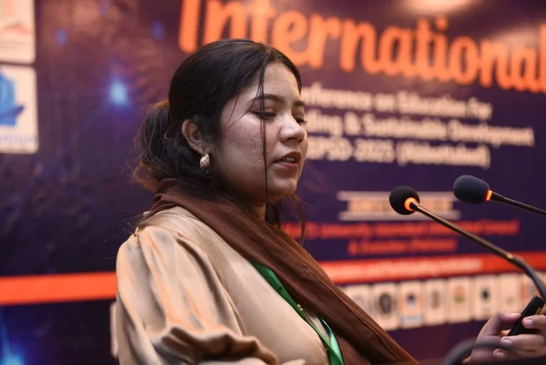 Young researcher presenting her work at ICEPSD-25, COMSATS University Abbottabad Campus