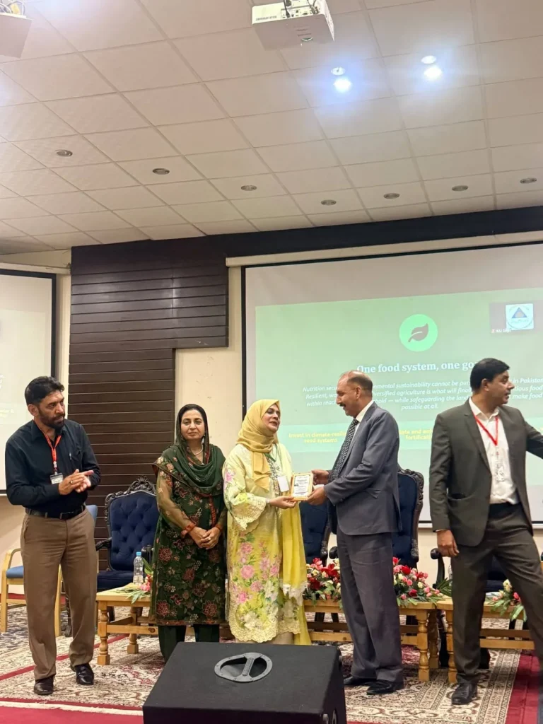 Shield presented to a woman delegate at the 21st ICFAS-26 in Gilgit