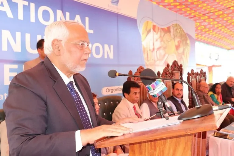 Chief guest speaking from the rostrum at the International Food & Nutrition Conference 2022 in Swat