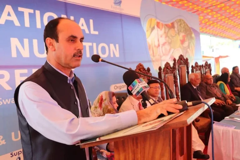 Speaker addressing the audience at the International Food & Nutrition Conference 2022 in Swat