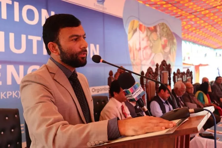 Young researcher presenting his work at the International Food & Nutrition Conference 2022 in Swat