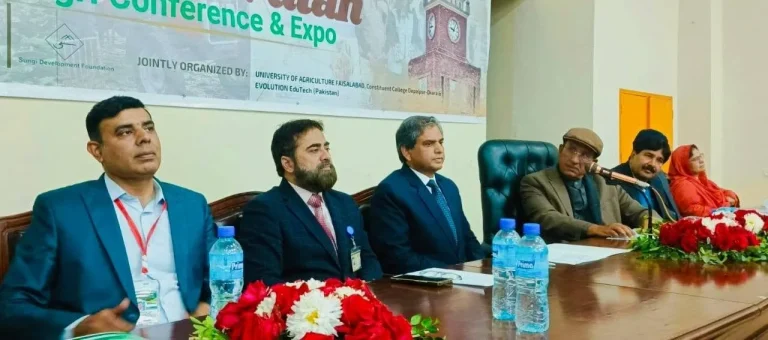 Dignitaries seated on the stage panel under the IRWACE-25 conference banner in Okara
