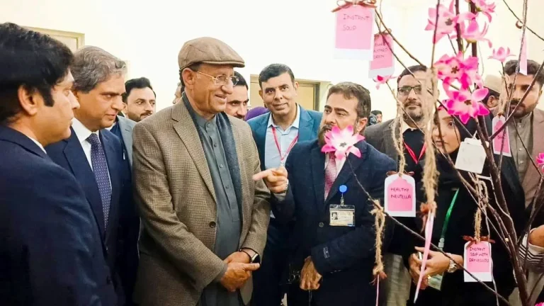 Chief guest visiting a student food-innovation stall at the IRWACE-25 Agriculture Expo