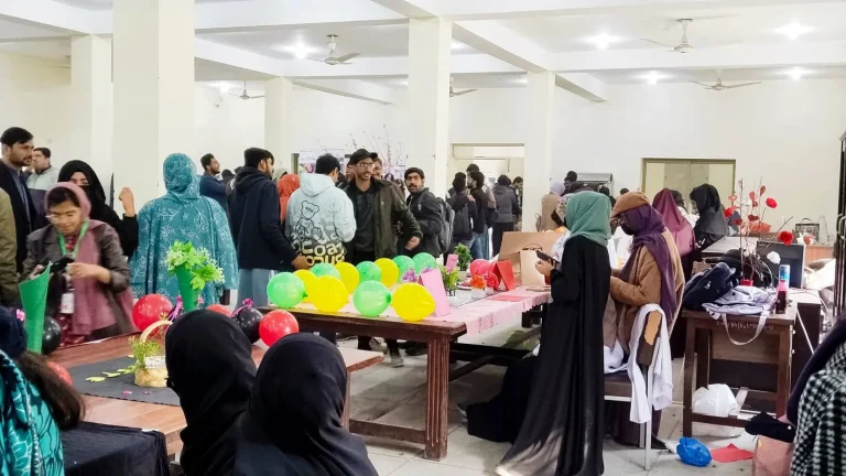 Students and visitors at the stalls in the IRWACE-25 Agriculture Expo hall in Okara