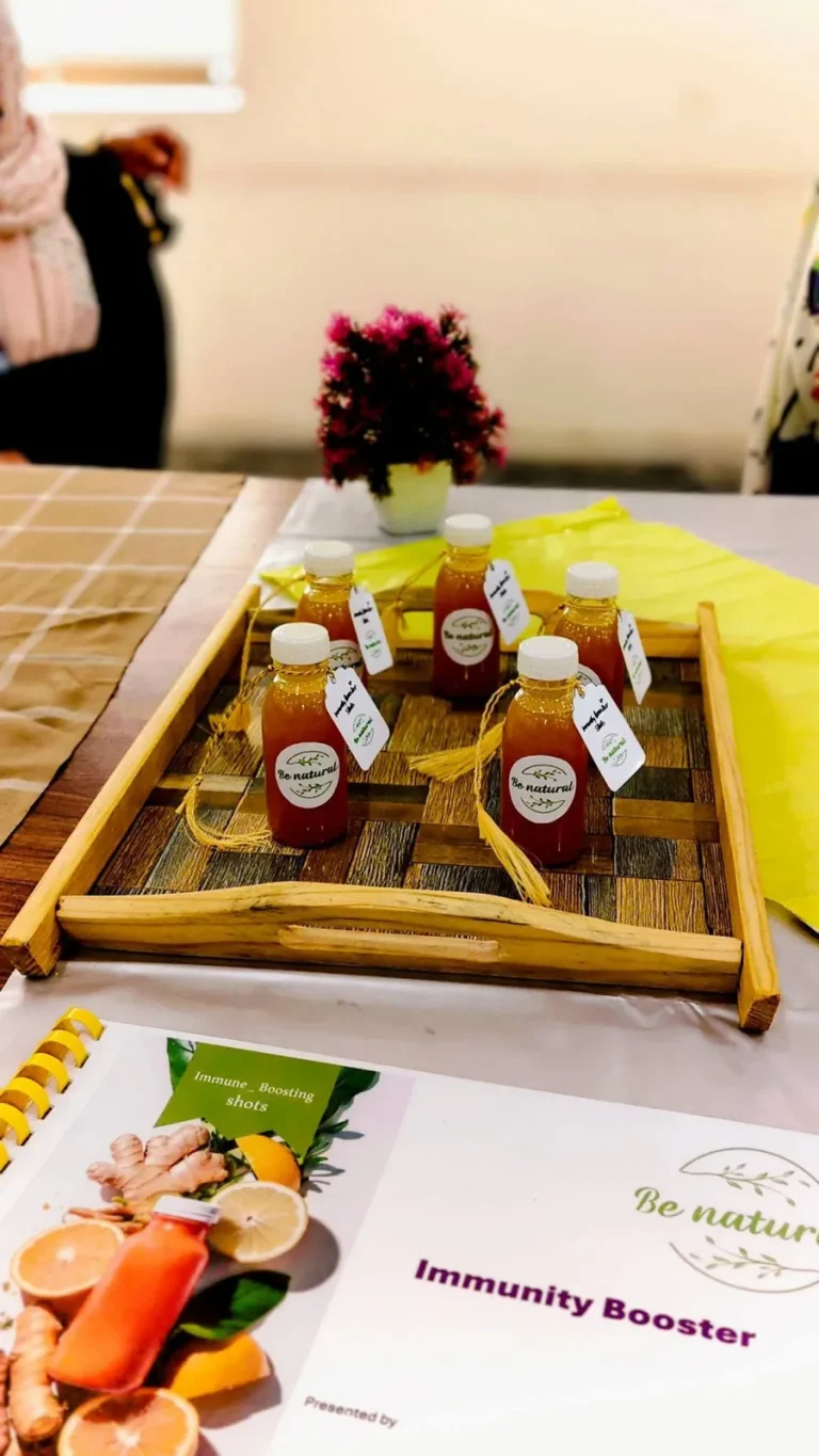 Close-up of "Be natural" immunity booster shots at the IRWACE-25 Agriculture Expo in Okara